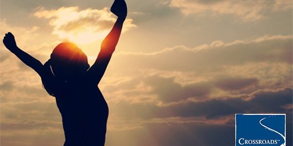 woman with hands in the air celebrating Overcoming fear and finding healing