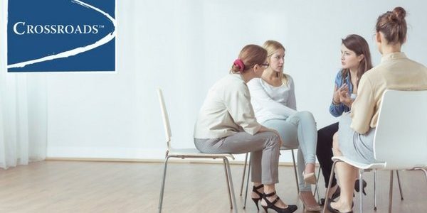 women's group therapy discussing their addiction recovery