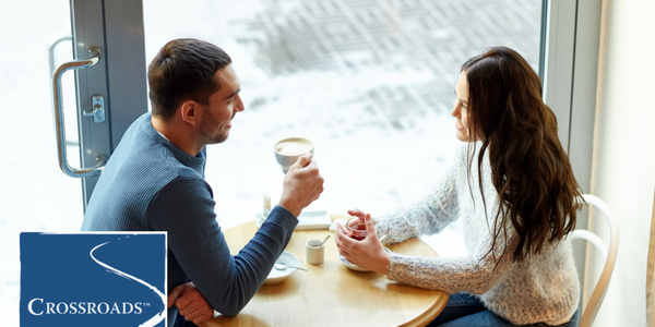 Couple talking over Coffee to rebuild their trust in each other after addiction treatment