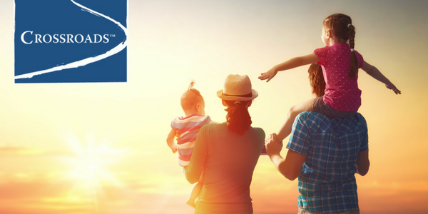 family looking towards the sunset and ready to move forward after addiction