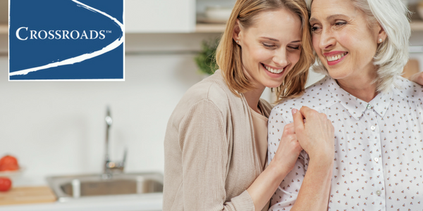 mother and adult daughter in the kitchen working together to reduce risk of addiction family history