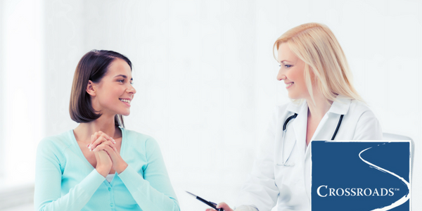 woman talking to her doctor about finding freedom in recovery