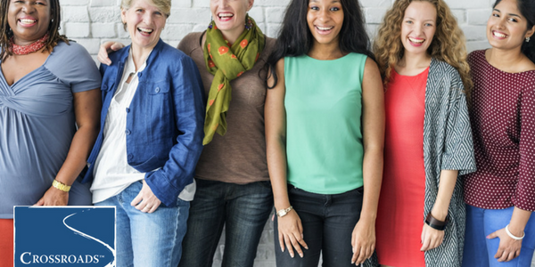 diverse group of smiling women managing addiction and anxiety together
