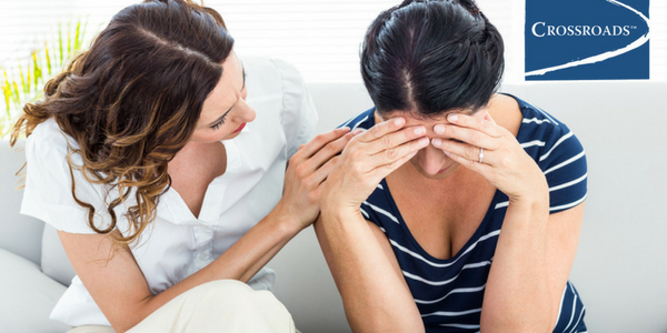 woman consoling her wife to stop blaming herself
