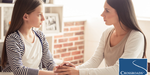 mother talking to child about drug prevention