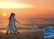 two women strolling down the beach at sunset discussing the right drug and alcohol treatment center