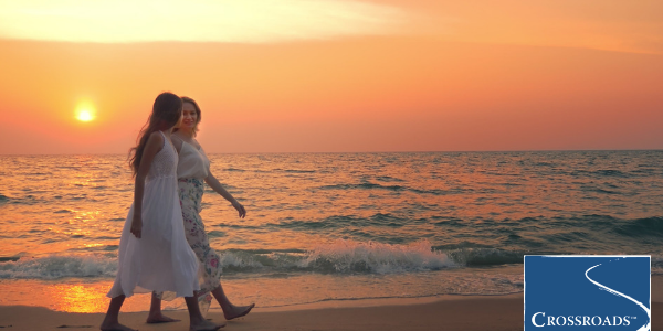 Finding the Right Drug and Alcohol Treatment Center.CRBlog1 two women strolling down the beach at sunset discussing the right drug and alcohol treatment center