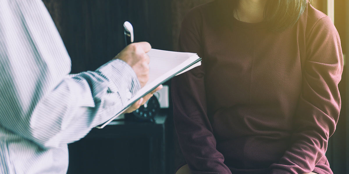 a young woman asks a doctor do i need alcohol treatment