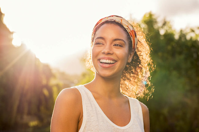 happy woman after learning about the different eating disorders and finding help