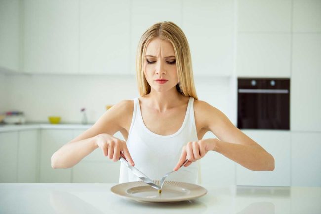 eating disorders (2) woman struggling with eating disorders and addiction