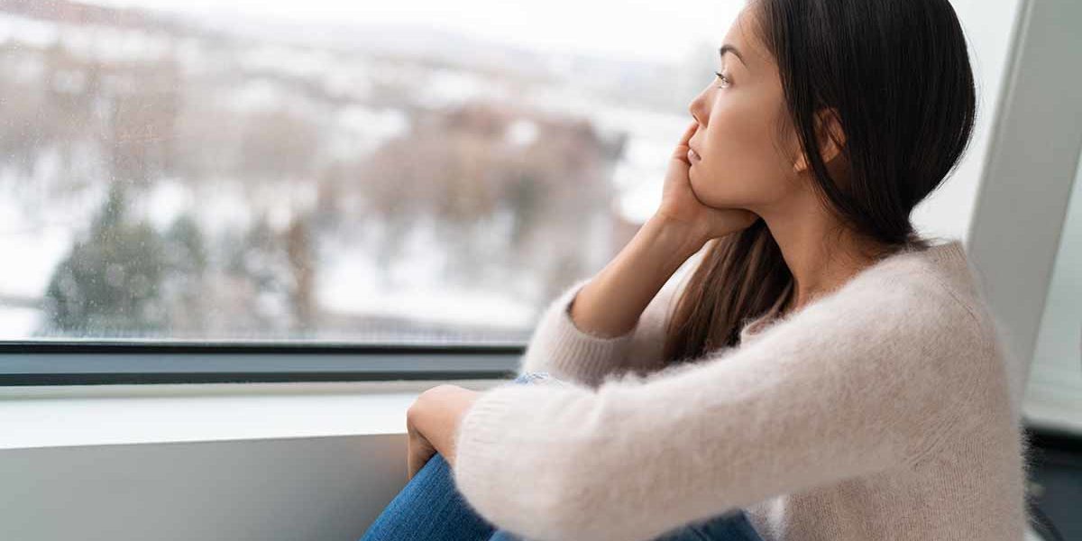 a woman struggles with secondary trauma