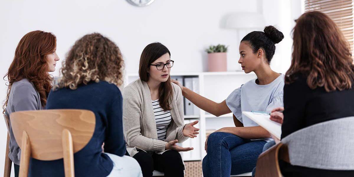 Women Supporting One Another During National Eating Disorder Awareness Week