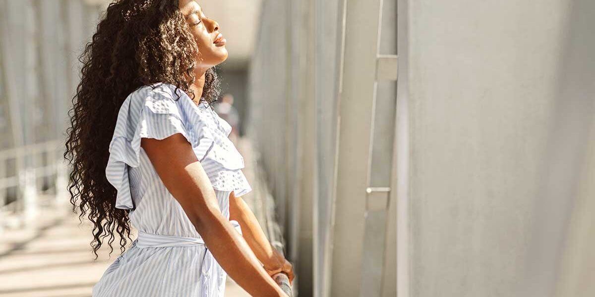 a woman experiencing benefits of holistic therapy