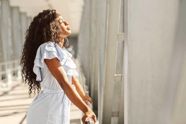 a woman experiencing benefits of holistic therapy