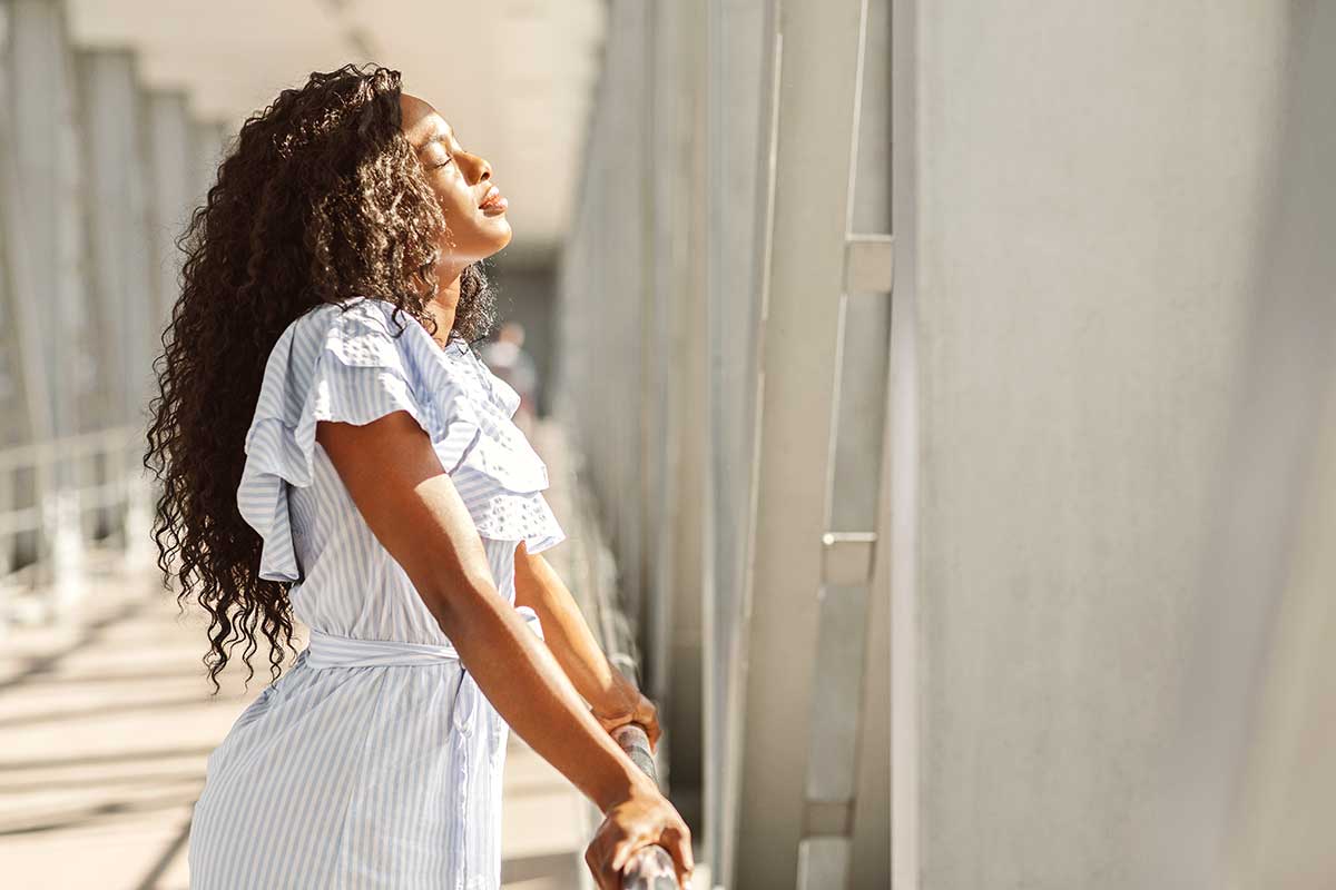 a woman experiencing benefits of holistic therapy