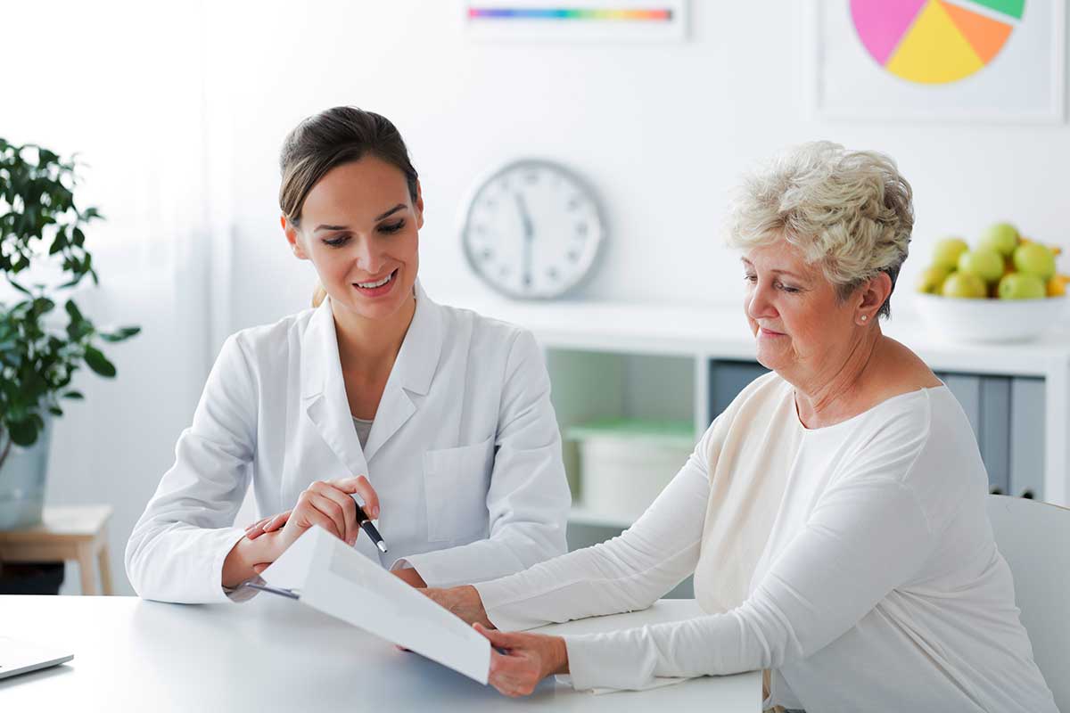 a woman looks at her treatment options for binge eating disorder