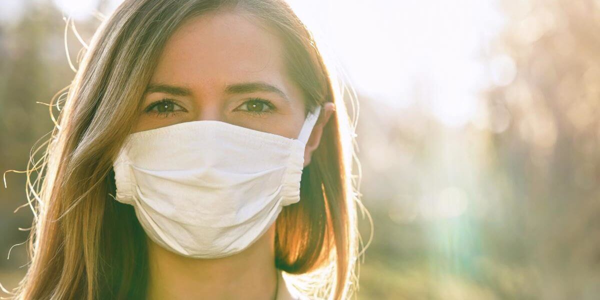 a woman pushes through covid-19 and addiction