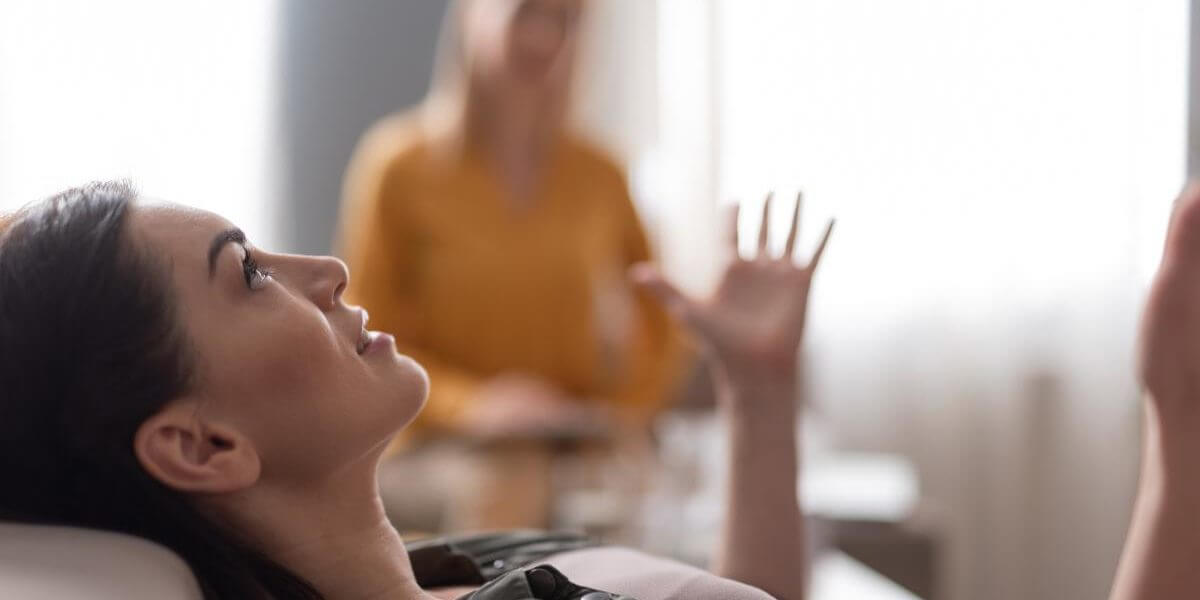 a busy woman benefits from outpatient addiction treatment