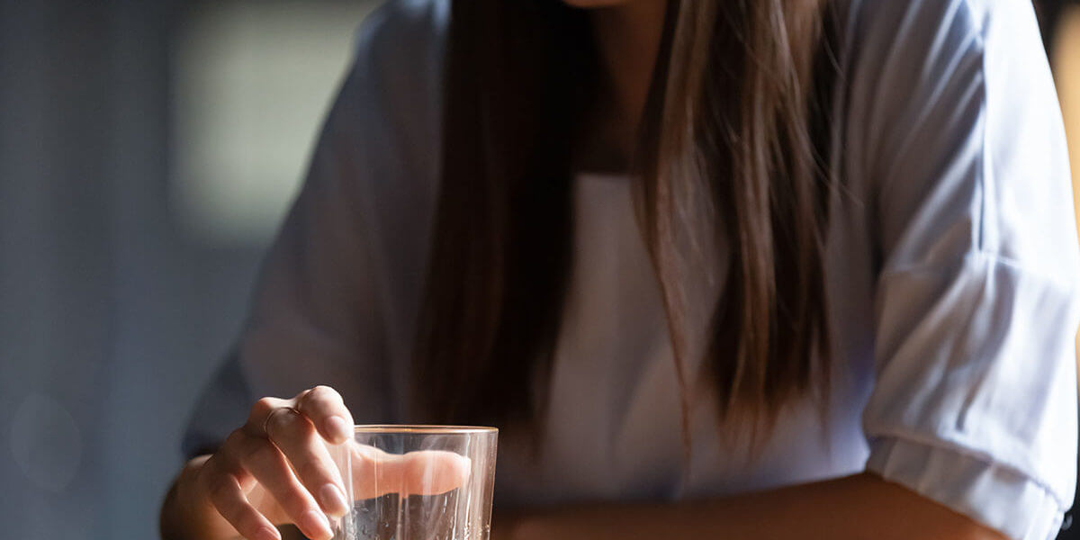 How Alcoholism Affects Your Daily Routine a woman knows she needs an alcoholism rehab