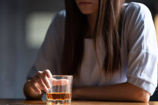 How Alcoholism Affects Your Daily Routine a woman knows she needs an alcoholism rehab
