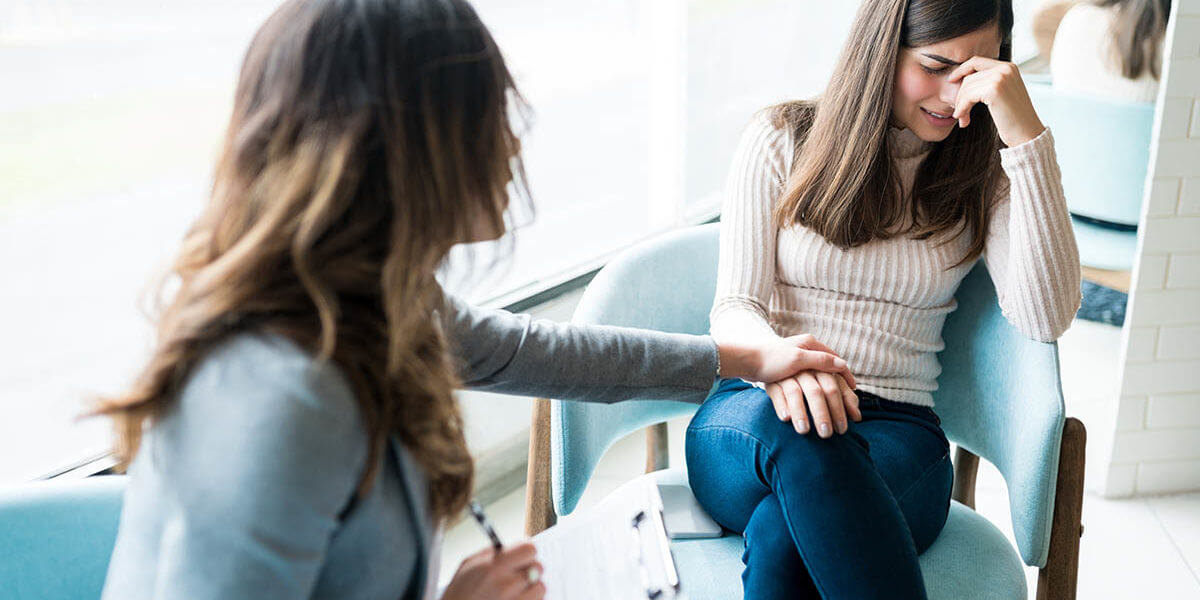 a woman asks about the risks of alcohol abuse and cancer