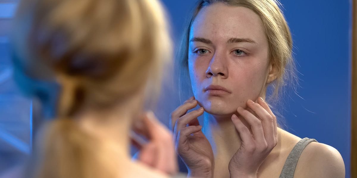 a woman looks for support on national eating disorders awareness week