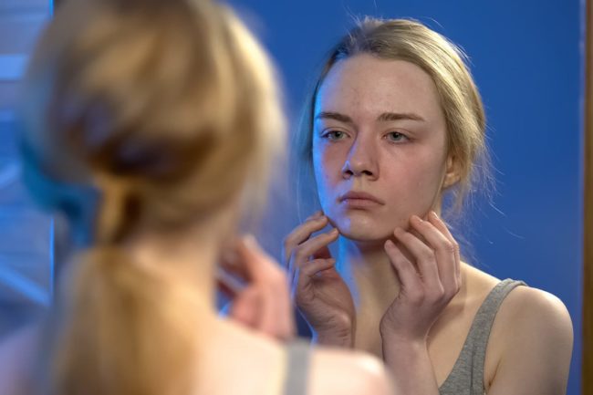 How to Support Women on National Eating Disorders Awareness Week a woman looks for support on national eating disorders awareness week