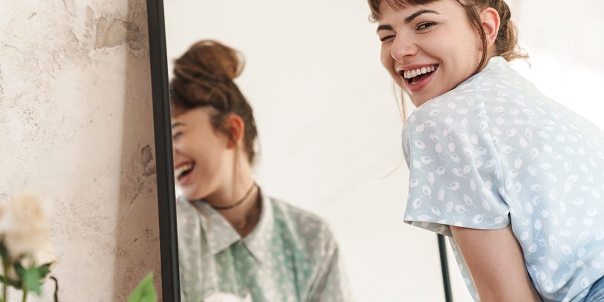 a woman celebrates eating disorder recovery